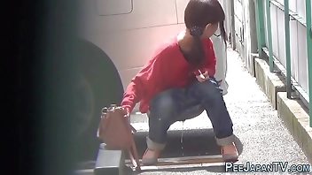 Japanese slut urinating in public street