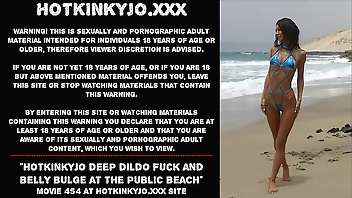Hotkinkyjo deep dildo fuck and belly bulge at the public beach