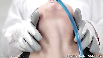 Make a sound with a ribbon wrapped around the neck, drinking water and swallowing