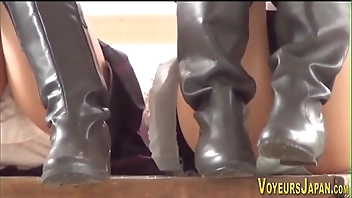 Asians in big boots show panties