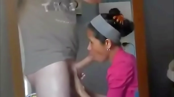 The cleaning lady here at home sucking my cock