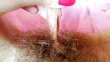 Hairy fetish video big clit hood pulling labia play and wet pussy fingering