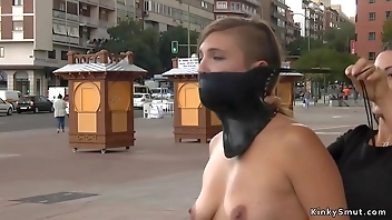 Naked babe in latex stockings in public