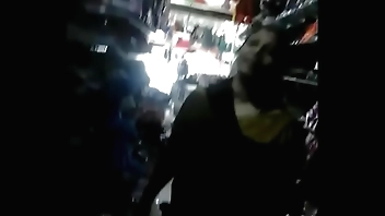 Indian Aunty showing off body in shop part 2