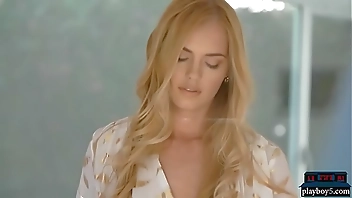 Two gorgeous blonde MILF models stripteasing and posing