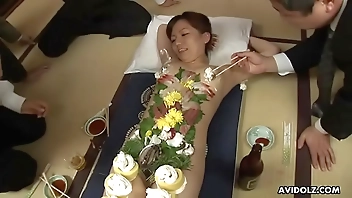 Old perverted businessman eat some sushi of hot chicks body