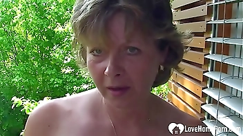 Busty MILF shows her pussy in a close-up