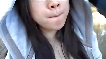 My cute asian girlfriend sucking me off in a public park and swallowing