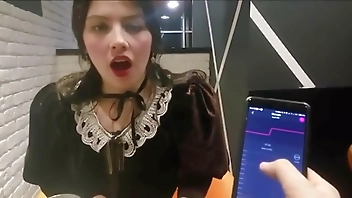 Cute young girl gets vibrated her pussy at public place