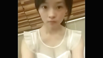 Cute chinese teen dancing on webcam