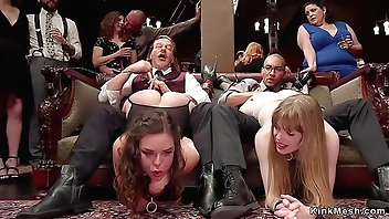 Slaves sucking at bdsm orgy