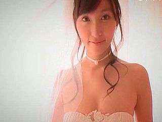 Japanese cutie with a kinky side plays with her nipples in Tokyo