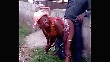 African woman fucks her man in public