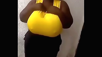 Huge breasted African girl dancing