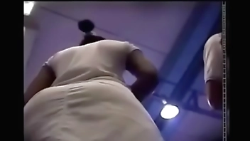 Upskirt fit black mom standing in line