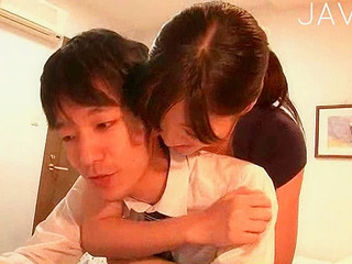 Sexy Nippon chick gets hot 'n' horny with XXX body massage